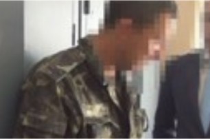 В Днепропетровске поймали офицера военкомата, который «отмазывал» от мобилизации