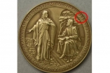 Ватикан выпустил юбилейные монеты с ошибкой в имени Иисуса