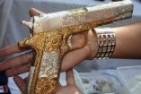 Золотой пистолет и драка в Госдуме