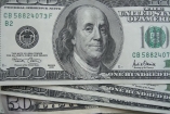 Эксперты: курс доллара снизился под влиянием договоренностей Украины и России