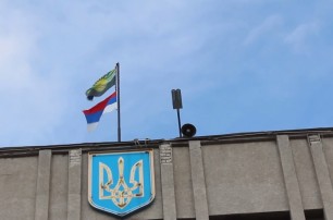 В Славянске подняли российский флаг вверх ногами