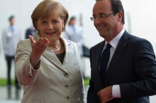 Меркель и Олланд собрались мирить Россию с Украиной
