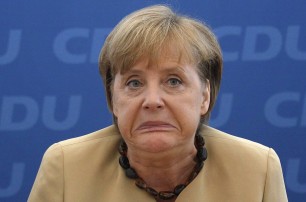 Меркель призывает Киев к переговорам с Донбассом