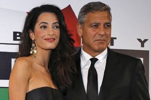 Джордж Клуни с женой хотят усыновить сирийского ребенка