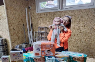 В столице УПЦ передала помощь и детское питание более 200 нуждающимся семьям