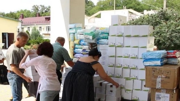 На Миколаївщині УПЦ передали допомогу біженцям, дітям та притулкам для тварин